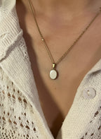 Mother’s Grace – Oval of Milk Gold